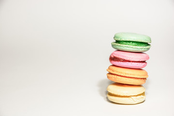Sweet and colourful french macaroons on retro-vintage