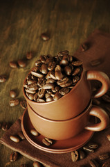 Coffee beans in cup