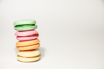 Sweet and colourful french macaroons on retro-vintage