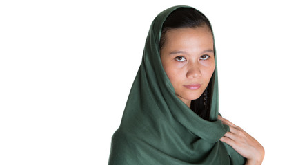 Muslim woman with a green headscarf