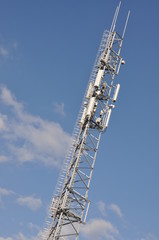 Steel telecommunication tower with antenna system