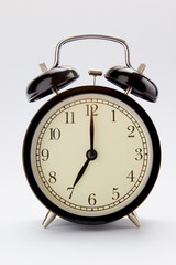 Classic alarm clock at 7 O'clock