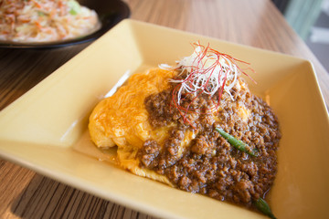 omelette rice, rice with Japanese style omelette and pork