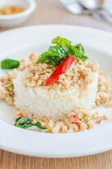 Spicy fried chicken with basil and rice