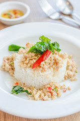 Spicy fried chicken with basil and rice