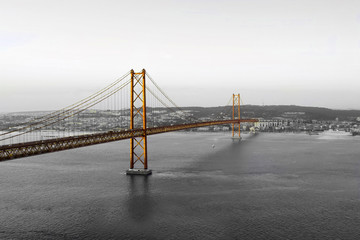 Golden Bridge on a monochromatic background, evening in Lisbon