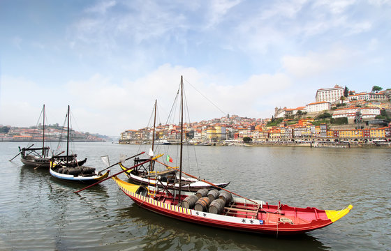 Douro riverside and boats with wine barrels, Porto, Portugal