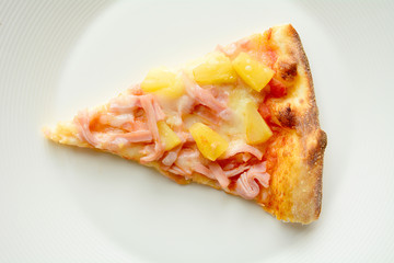Pizza on white plate