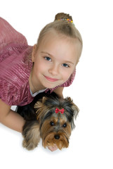 Young girl with puppy, cute Yorkshire terrier - best friends