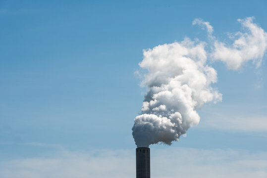 White smoke from an industrial chimney