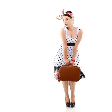 Pinup girl with suitcase in dress spotted, full length retro por