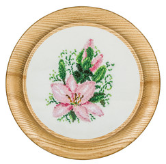 Embroidered picture in the frame, isolated on white background