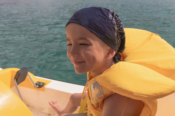 the child on the catamaran