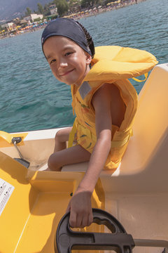 the child on the catamaran