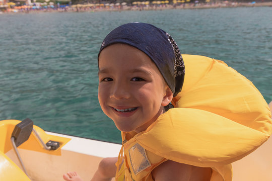 the child on the catamaran