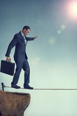 balancing businessman