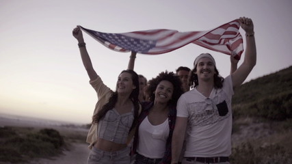 Group of friends with american flag - Powered by Adobe