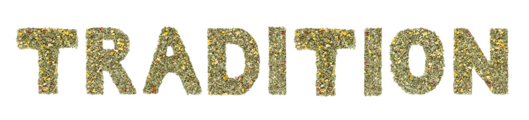 Word TRADITION spelled out with  herbs and tea leaves