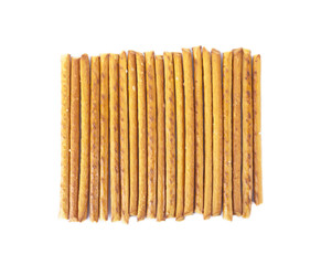 Salted sticks arranged vertically isolated on white