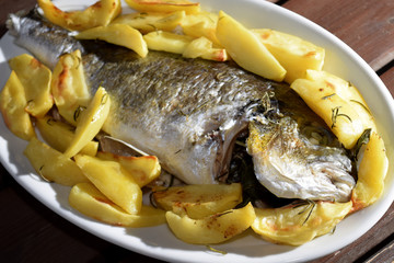 baked sea bream with potatoes