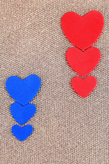 Obraz premium Hearts made of felt on golden background