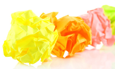Colorful crumpled paper balls isolated on white
