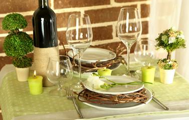 Beautiful holiday Easter table setting in green tones,
