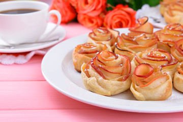 Obraz na płótnie Canvas Tasty puff pastry with apple shaped roses