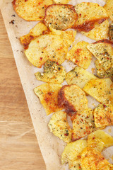 Homemade potato chips on table, close up