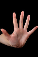 Human hand on black background