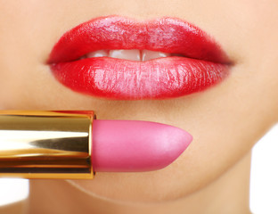 Obraz premium Beautiful female lips with lipstick, close up