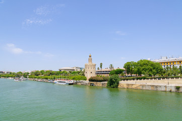 Obraz premium The Torre del Oro and Rio Guadalquivir in Sevilla, Spain