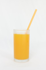 Glass of orange juice on white background