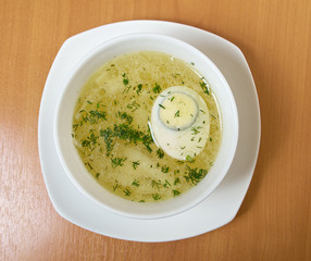 Chicken broth with dill and egg.