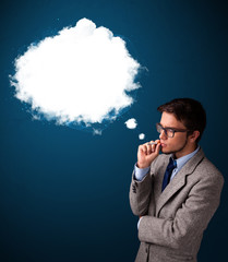 Young man smoking unhealthy cigarette with dense smoke