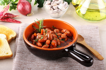 Bean soup in terracotta bowl