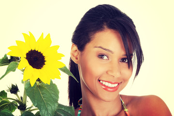 Happy summer girl portrait with sunflower