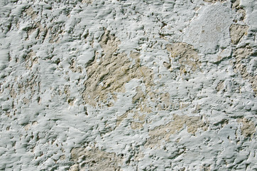 Weathered limewashed wall