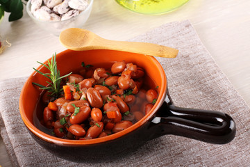 Bean soup in terracotta bowl