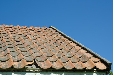 Broken tiled roof