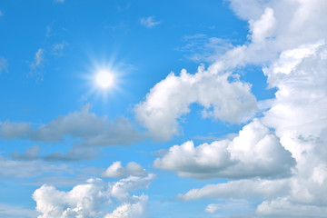 Naklejka na ściany i meble blue sky background with tiny clouds and sun