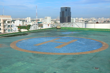 Fototapeta premium Helicopter Pad on Roof top Building.