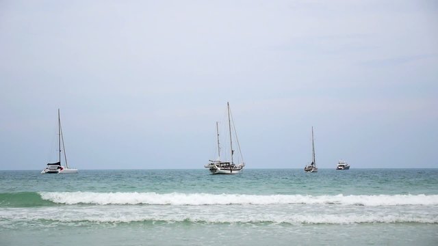 Anchored Boats Dancing on the Foamy Waves. Speed up. Koh Samui.