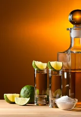 Tuinposter gold tequila with salt and lime © Igor Normann