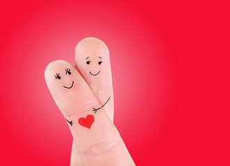 happy couple hug concept, painted at fingers against red
