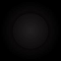 Black circle on a black background. Copy Space.