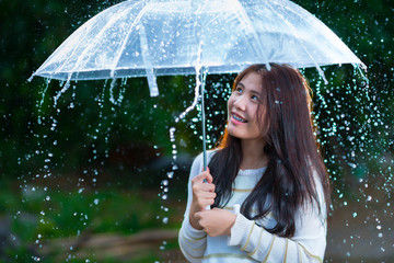 girl is playing with rain