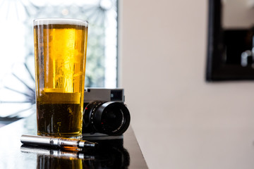 Electronic cigarette, beer and camera