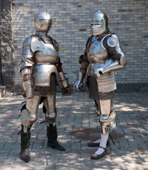 two knights in the ancient metal armor