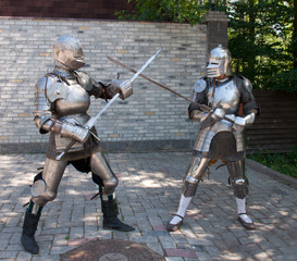 two knights in the ancient metal armor